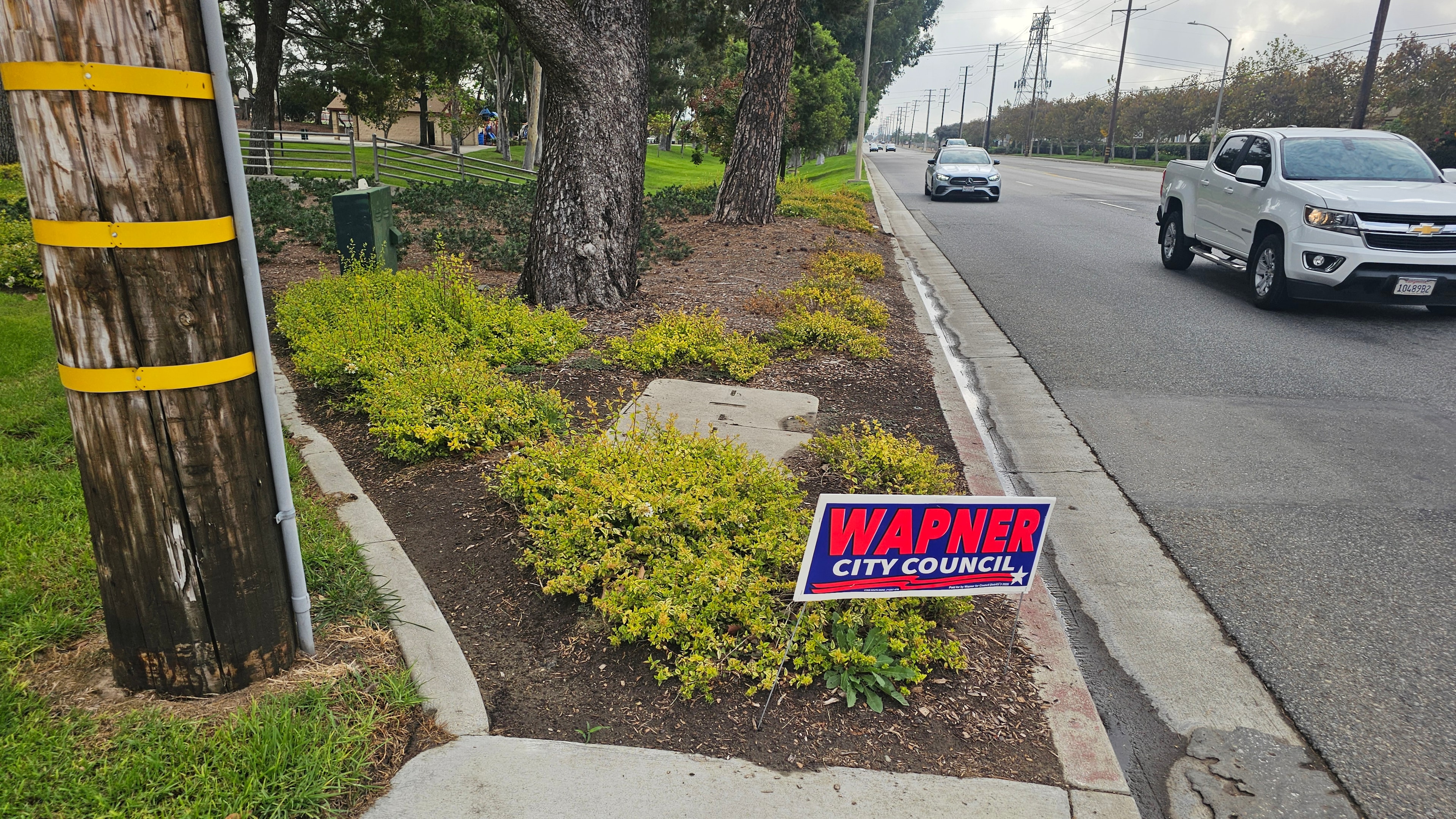 Resident-submitted photograph of a Larry Trinidad for Ontario City Council District 3 campaign sign in a City-owned parkway in front of the residence of Ontario mayoral candidate Kevin Kizzee, September 21, 2026.